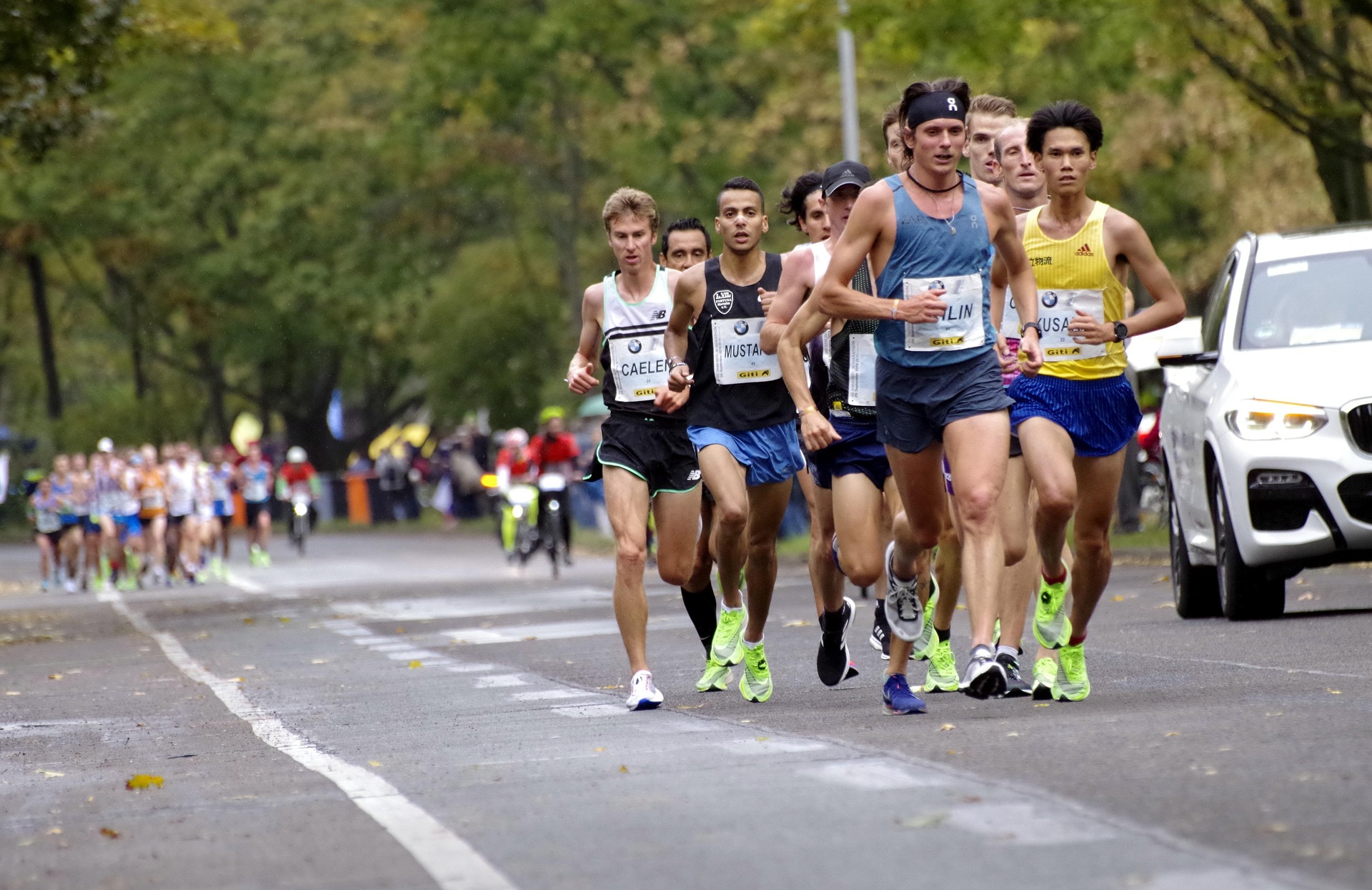 Runners leading a road race
